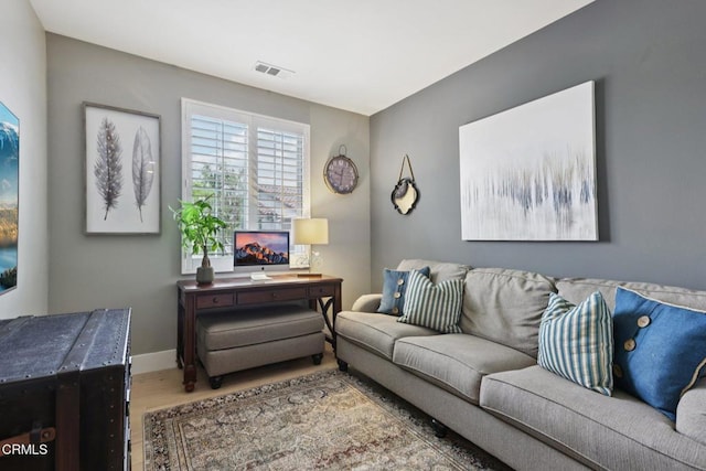 3224 Lisbon Ln, Oxnard, CA 93036 - living area featuring wood finished floors and baseboards