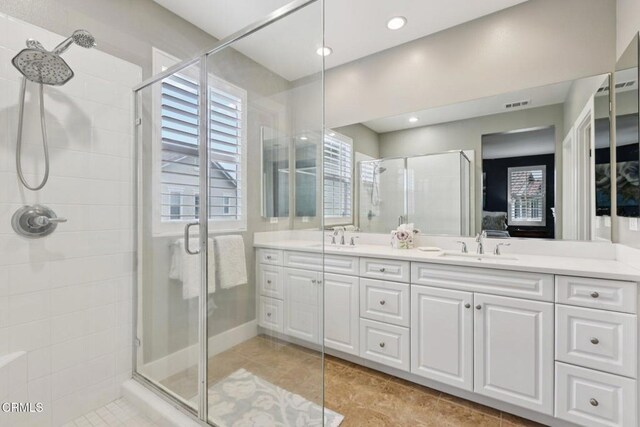 3224 Lisbon Ln, Oxnard, CA 93036 - bathroom featuring a stall shower, double vanity, and tile patterned floors