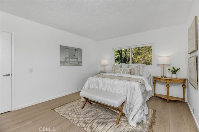 1385 Terrace Way, Laguna Beach, CA 92651 - bedroom with light wood finished floors and a textured ceiling