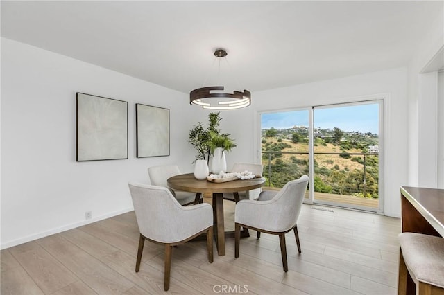 1385 Terrace Way, Laguna Beach, CA 92651 - dining area featuring light wood finished floors and a chandelier