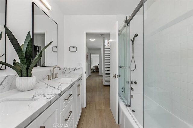 1385 Terrace Way, Laguna Beach, CA 92651 - full bath with connected bathroom, double vanity, bath / shower combo with glass door, and wood finished floors
