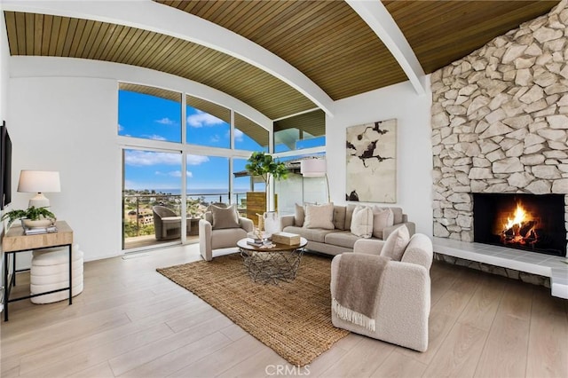 1385 Terrace Way, Laguna Beach, CA 92651 - living area with wood finished floors and a stone fireplace