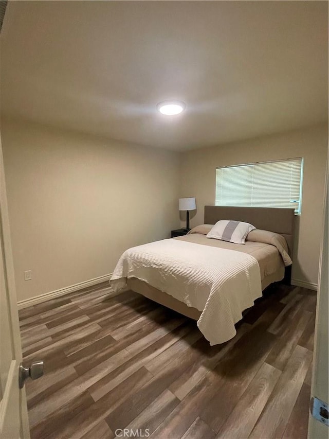 45461 Saigon Ave, Lancaster, CA 93534 - bedroom with wood finished floors, baseboards, and recessed lighting