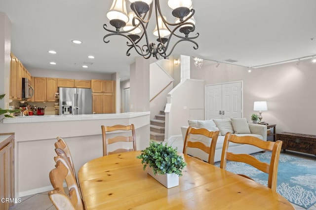 1323 Lost Point Ln, Oxnard, CA 93030 - dining room featuring recessed lighting, stairway, and a chandelier