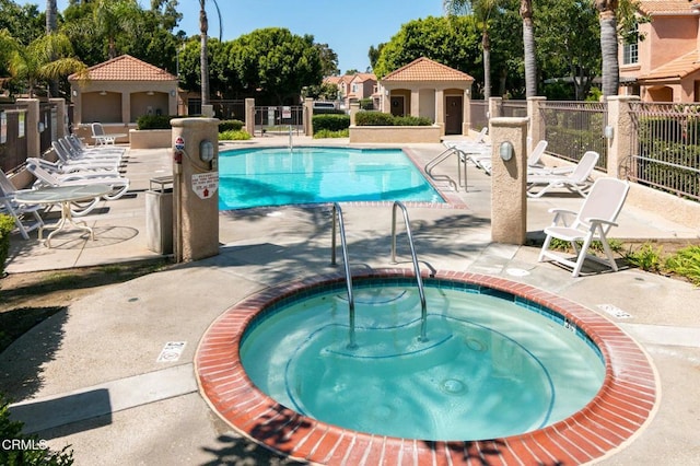 1323 Lost Point Ln, Oxnard, CA 93030 - community pool featuring a patio and a community hot tub