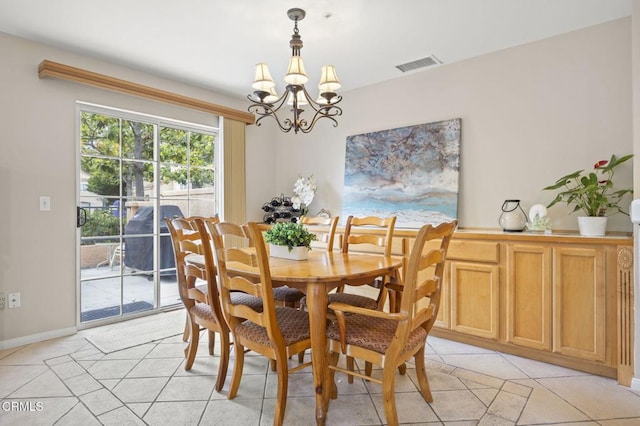 1323 Lost Point Ln, Oxnard, CA 93030 - dining room with a chandelier and light tile patterned floors