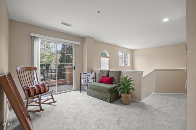 1323 Lost Point Ln, Oxnard, CA 93030 - living area featuring carpet floors, an upstairs landing, and recessed lighting