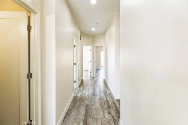 453 N 13th St, Grover Beach, CA 93433 - hallway with wood finished floors and recessed lighting