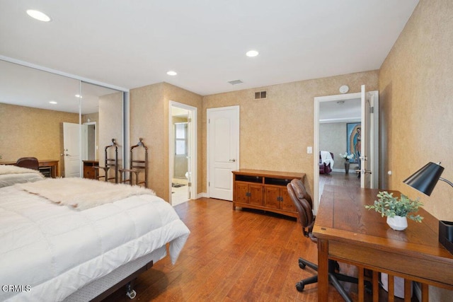 1519 Lyndhurst Ave, Camarillo, CA 93010 - bedroom featuring wood finished floors, an office area, recessed lighting, and connected bathroom