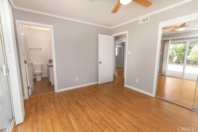 3760 Fielding Cir, Sacramento, CA 95826 - unfurnished bedroom featuring ornamental molding, light wood-type flooring, baseboards, access to outside, and connected bathroom