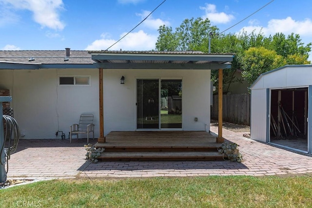 3760 Fielding Cir, Sacramento, CA 95826 - rear view of house featuring a deck, stucco siding, and a patio area