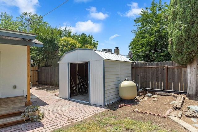 3760 Fielding Cir, Sacramento, CA 95826 - view of shed with a fenced backyard and central AC