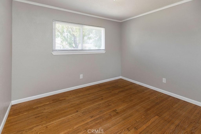 3760 Fielding Cir, Sacramento, CA 95826 - empty room with ornamental molding, wood finished floors, and baseboards