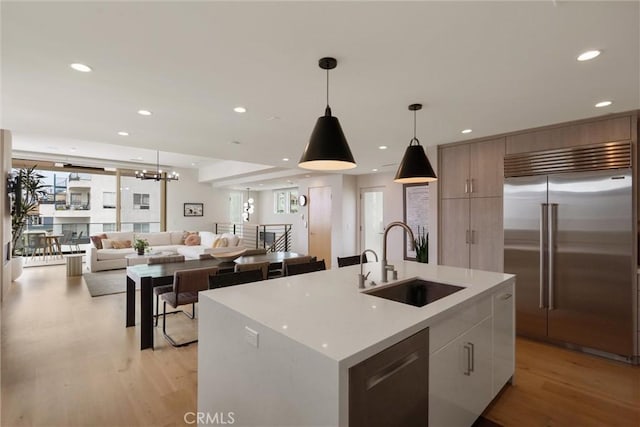 222 2nd St, Hermosa Beach, CA 90254 - kitchen featuring stainless steel appliances, light wood finished floors, modern cabinets, and recessed lighting