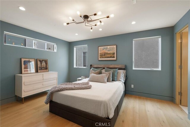 222 2nd St, Hermosa Beach, CA 90254 - bedroom featuring a chandelier, light wood-type flooring, and recessed lighting