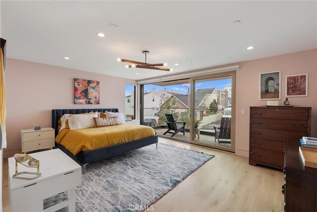 222 2nd St, Hermosa Beach, CA 90254 - bedroom with access to exterior, light wood-style floors, a chandelier, and recessed lighting