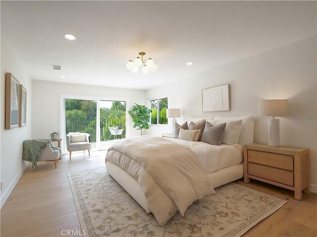 26633 Academy Dr, Palos Verdes Peninsula, CA 90274 - bedroom featuring a chandelier, access to exterior, light wood-style floors, and recessed lighting