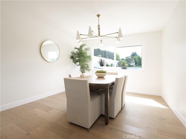 26633 Academy Dr, Palos Verdes Peninsula, CA 90274 - dining space featuring a chandelier and light wood-type flooring