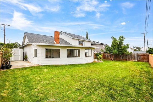 1432 N Shaffer St, Orange, CA 92867 - back of property with a fenced backyard, a shed, a patio, and a chimney