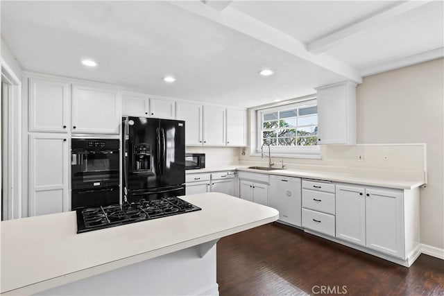 1432 N Shaffer St, Orange, CA 92867 - kitchen featuring black appliances, white cabinetry, recessed lighting, light countertops, and dark wood-style floors