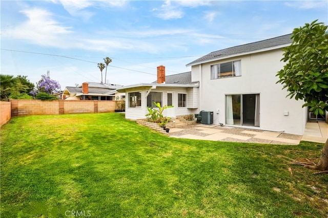 1432 N Shaffer St, Orange, CA 92867 - rear view of house with a fenced backyard, a chimney, stucco siding, and a patio