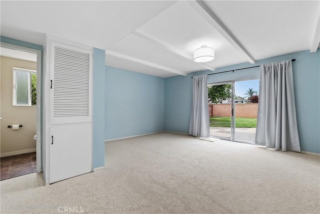 1432 N Shaffer St, Orange, CA 92867 - unfurnished bedroom with access to outside, carpet flooring, beam ceiling, and a closet
