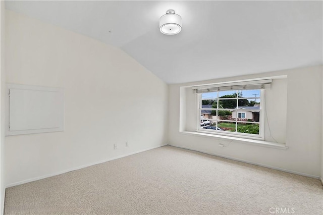 1432 N Shaffer St, Orange, CA 92867 - carpeted spare room with lofted ceiling and baseboards