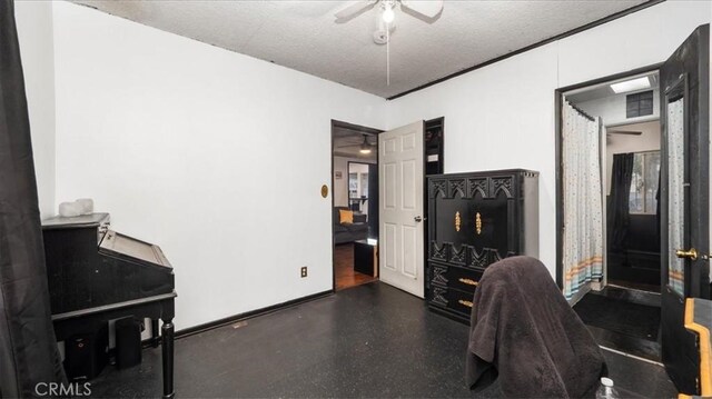 3902 Live Oak St, Cudahy, CA 90201 - home office featuring ceiling fan and a textured ceiling
