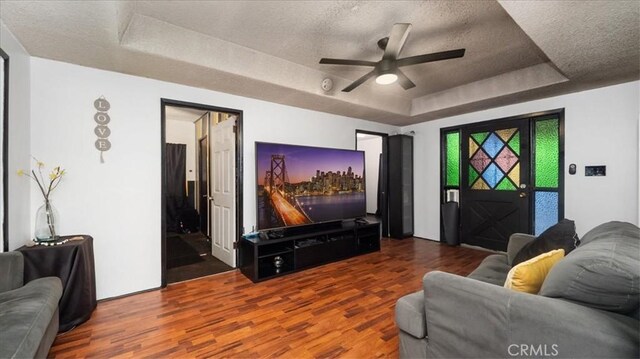 3902 Live Oak St, Cudahy, CA 90201 - cinema room featuring a raised ceiling, a textured ceiling, wood finished floors, and ceiling fan