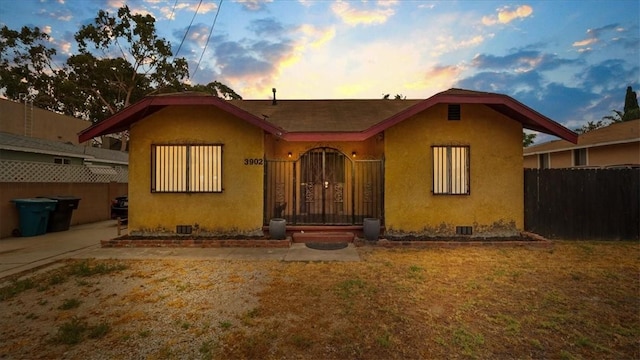 3902 Live Oak St, Cudahy, CA 90201 - bungalow-style home with crawl space and stucco siding