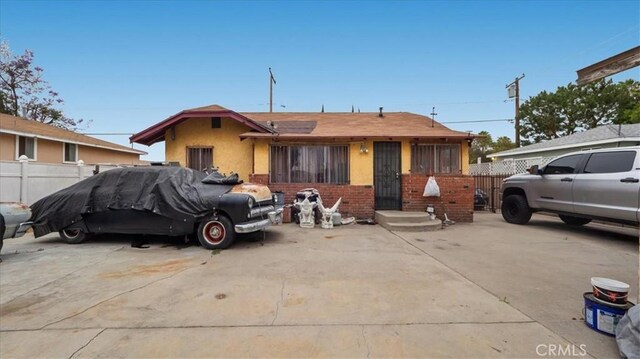 3902 Live Oak St, Cudahy, CA 90201 - bungalow with brick siding and stucco siding