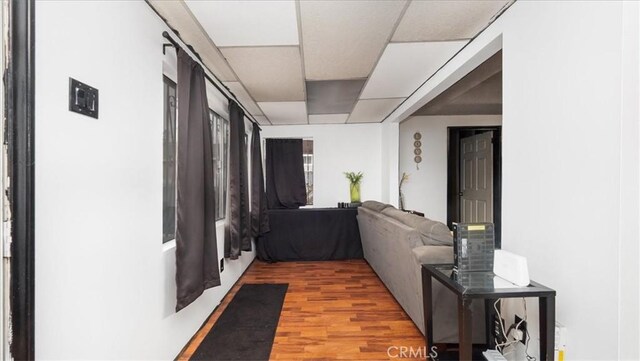 3902 Live Oak St, Cudahy, CA 90201 - corridor with light wood finished floors and a paneled ceiling