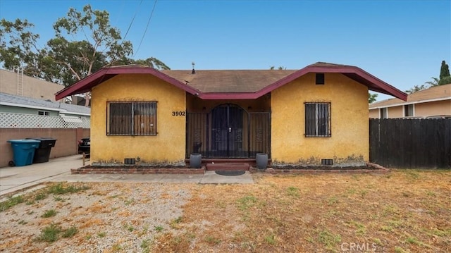 3902 Live Oak St, Cudahy, CA 90201 - bungalow-style house with stucco siding and crawl space