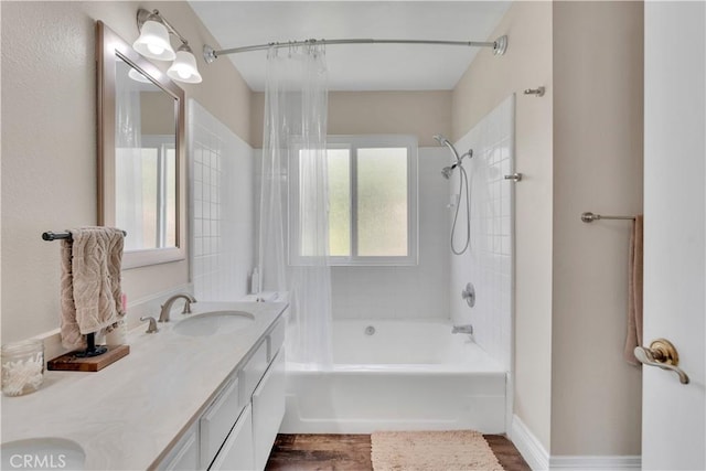3074 Mountain Top Dr, Highland, CA 92346 - bathroom with shower / bath combo with shower curtain, double vanity, and wood finished floors