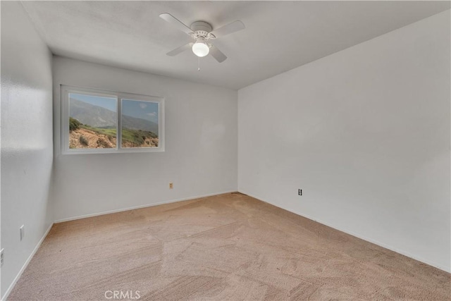 3074 Mountain Top Dr, Highland, CA 92346 - empty room with carpet floors, ceiling fan, and baseboards