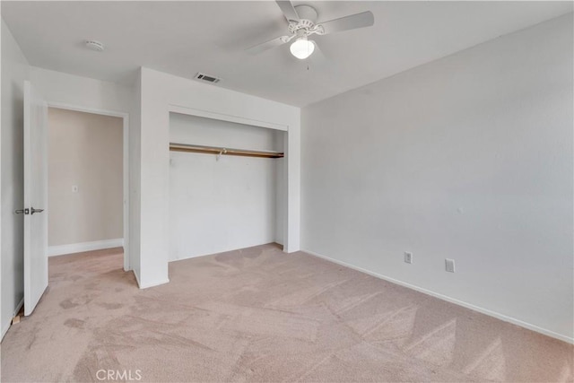 3074 Mountain Top Dr, Highland, CA 92346 - unfurnished bedroom with carpet floors, a closet, a ceiling fan, and baseboards