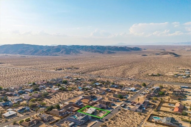 6646 Quail Spring Ave Unit 29, Palms, CA 92277 - aerial view of sparsely populated area featuring a desert landscape and a mountainous background