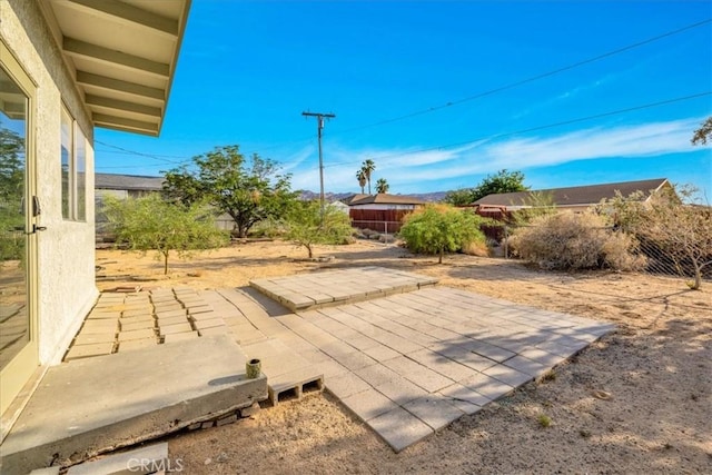 6646 Quail Spring Ave Unit 29, Palms, CA 92277 - fenced backyard featuring a patio area