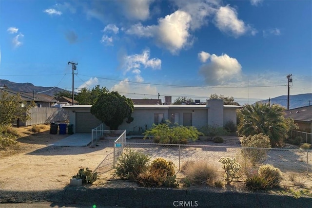 6646 Quail Spring Ave Unit 29, Palms, CA 92277 - back of house with an attached garage