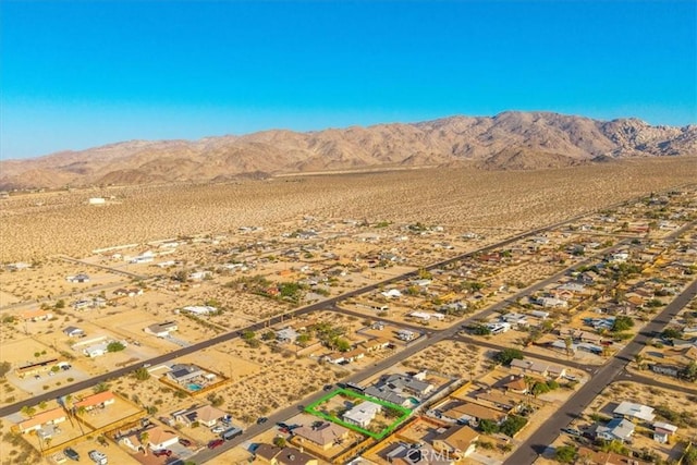 6646 Quail Spring Ave Unit 29, Palms, CA 92277 - aerial overview of property's location with mountains, a desert landscape, and nearby suburban area