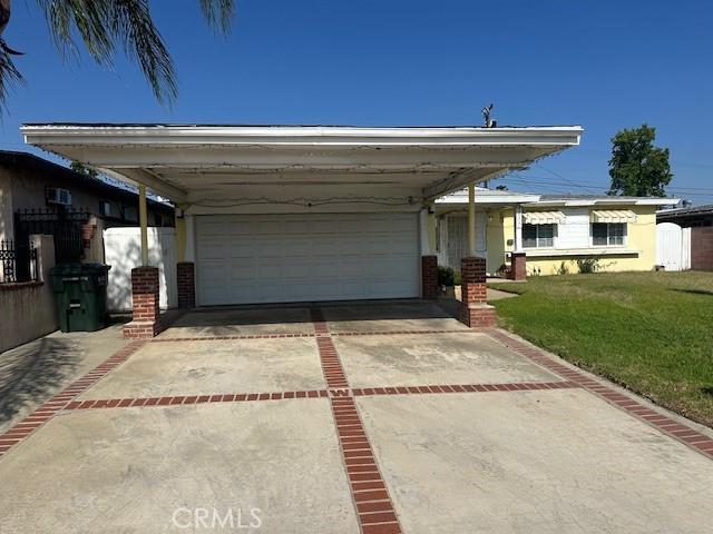 2440 Merrywood St, Pomona, CA 91767 - view of front facade featuring driveway