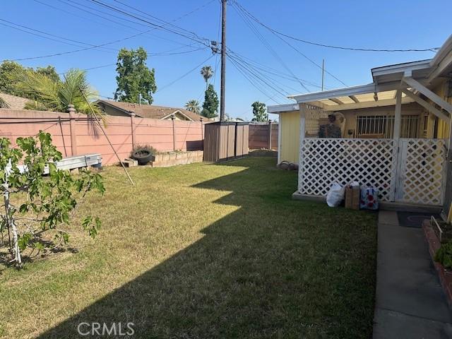 2440 Merrywood St, Pomona, CA 91767 - view of yard featuring a storage shed