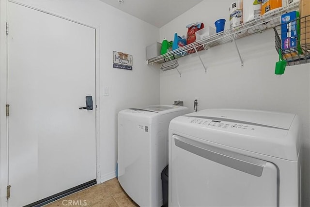 613 Flathead River St, Oxnard, CA 93036 - laundry room with washer and clothes dryer and light tile patterned floors