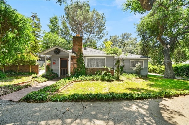 3095 Casitas Ave, Altadena, CA 91001 - view of front of home with a chimney and brick siding