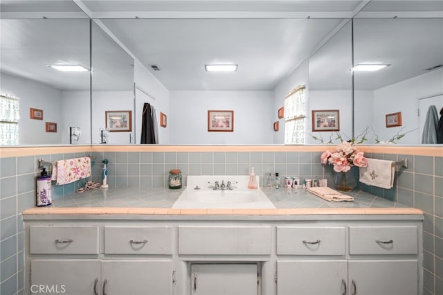3095 Casitas Ave, Altadena, CA 91001 - bathroom featuring vanity and tile walls