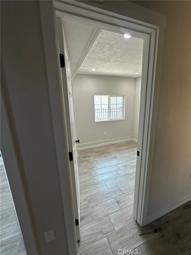 829 Foxworth Ave, La Puente, CA 91744 - corridor featuring wood finished floors, recessed lighting, and a textured ceiling