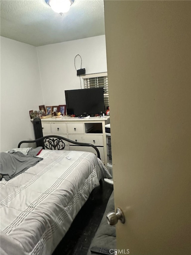 829 Foxworth Ave, La Puente, CA 91744 - bedroom featuring a textured ceiling