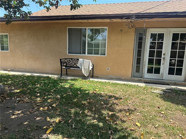 829 Foxworth Ave, La Puente, CA 91744 - back of house featuring a shingled roof, stucco siding, and a yard