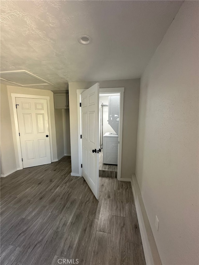 829 Foxworth Ave, La Puente, CA 91744 - unfurnished room featuring washer / dryer and dark wood finished floors