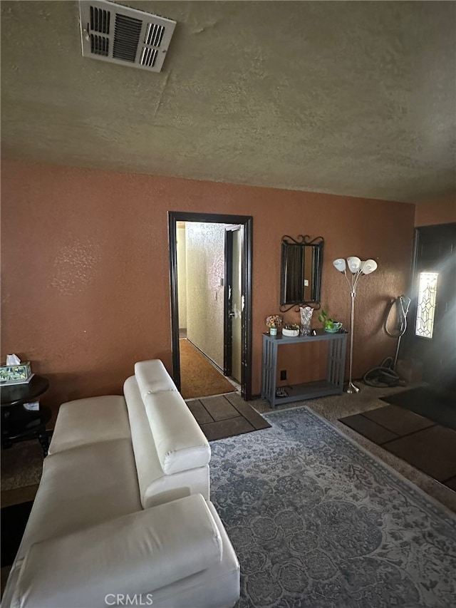 829 Foxworth Ave, La Puente, CA 91744 - living room featuring a textured ceiling